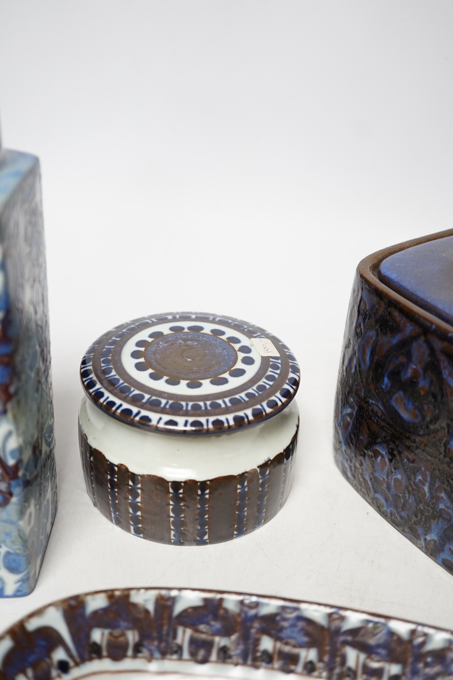 A pair of Royal Copenhagen pottery ‘fajance’ blue glaze vases and a squat jar and cover, together with an Alumina ware larger jar and cover and a rectangular tray signed CK, tallest 19cm